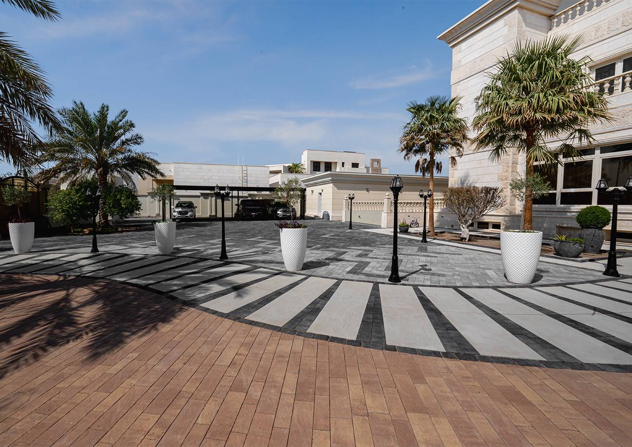 Contemporary outdoor patio with paving and seating areas